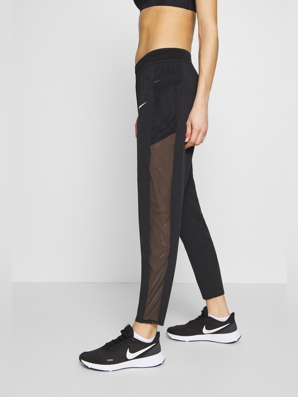 Like new Nike Black Dry fit running pants  with White  Logo ankle length